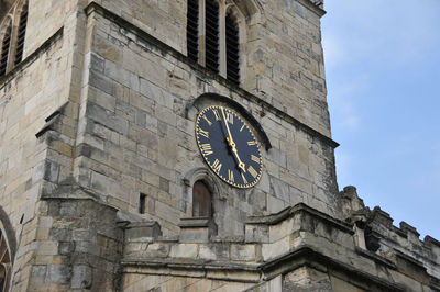 Detail photo of clock outside york cathedral, yorkshire, england