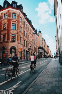 Man riding bicycle on street