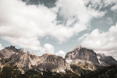 Low angle view of rock formations against sky