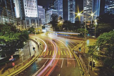 High angle view of light trails on road at night