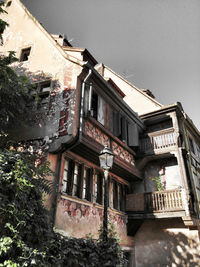 Low angle view of old building against sky