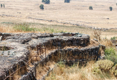 High angle view of old ruin on field