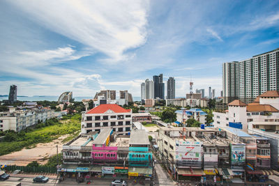 Buildings in city against sky