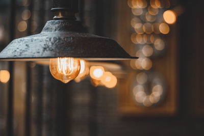 Close-up of illuminated light bulb