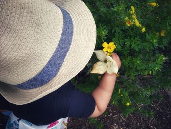 High angle view of woman holding flower bouquet