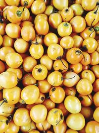 Full frame shot of oranges at market stall