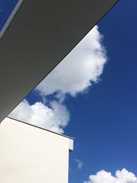 Low angle view of built structure against blue sky