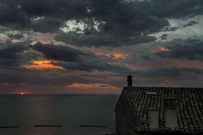 Scenic view of sea against sky during sunrise