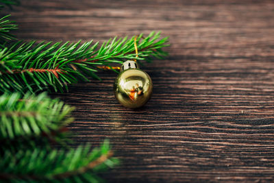 Close-up of christmas decorations on wooden table