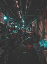 Interior of illuminated market at night