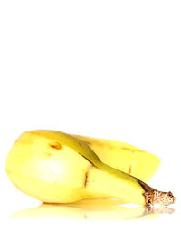 Close-up of fruit over white background