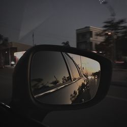 Reflection of sky on side-view mirror