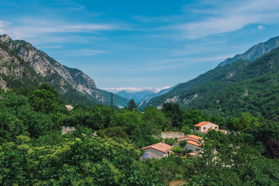 Aerial view of townscape amidst valley