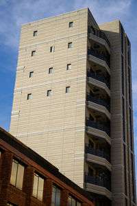 Low angle view of skyscraper against sky