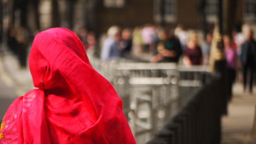 Close-up of woman walking in city