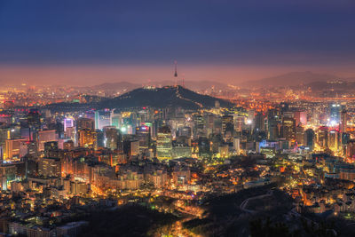 Illuminated cityscape at night