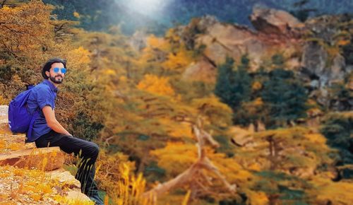 Man in forest during autumn