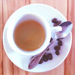 Close-up of coffee cup on table