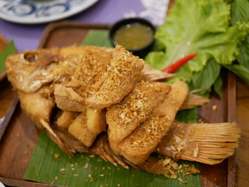 Close-up of food served on table