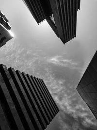 Low angle view of modern buildings against sky