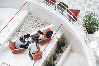 High angle view of business people in meeting at office