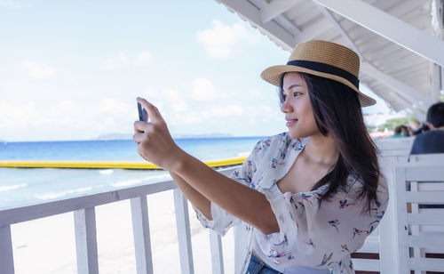 Young woman using mobile phone