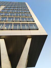 Low angle view of modern building against clear sky