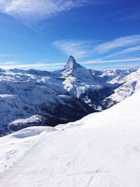 Scenic view of snowcapped mountains