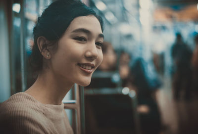 Portrait of a smiling young woman