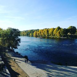 Scenic view of lake against sky during autumn