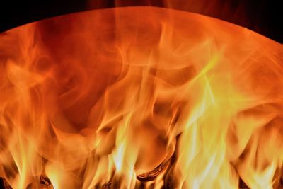 Close-up of yellow fire at night