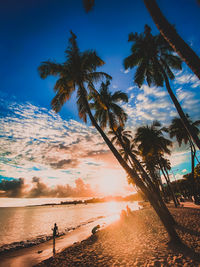 Scenic view of sea against sky at sunset