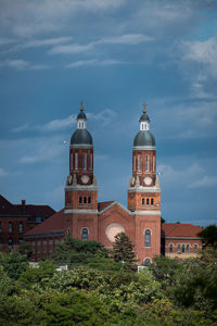 View of building against cloudy sky