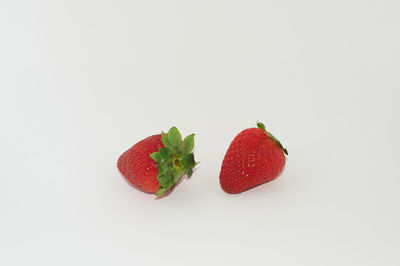 Close-up of strawberries against white background