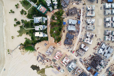 Aerial view of houses and buildings in town