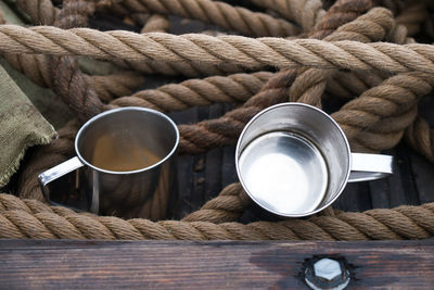 Close-up of coffee cup on wooden table