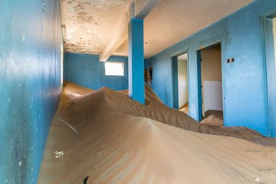 Sand take over deserted house building 