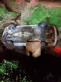 High angle view of old container on field