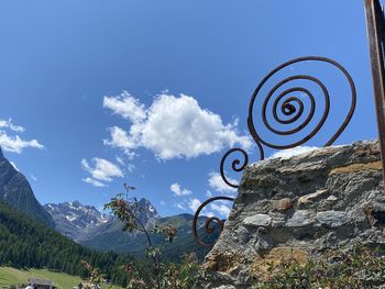 Low angle view of spiral staircase against sky