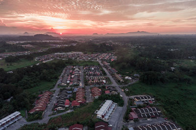 High angle view of cityscape against sky at sunset