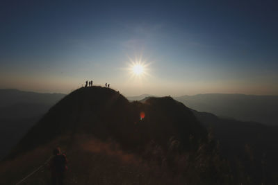 Silhouette mountain against sky during sunset