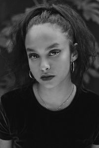 Close-up portrait of confident teenage girl