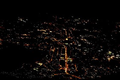 Illuminated cityscape at night