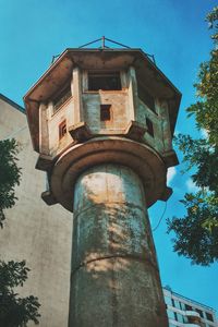 Low angle view of building against blue sky