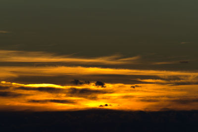 Low angle view of dramatic sky during sunset
