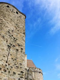 Low angle view of fort against blue sky