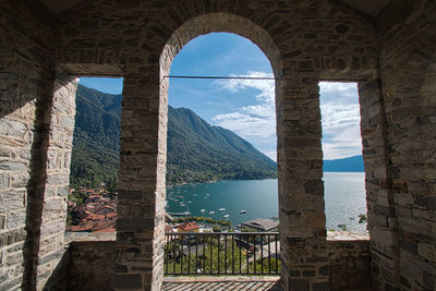 Scenic view of  lake through window