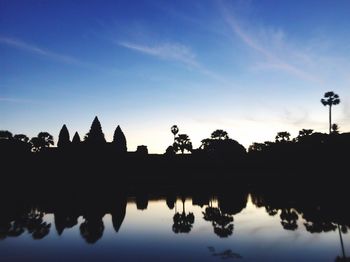 Silhouette of temple against sky during sunset