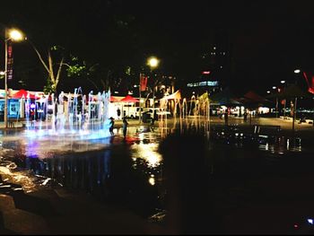 Illuminated street light at night