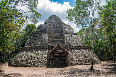 Low angle view of old ruins against sky